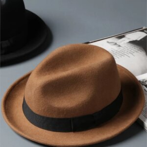 Four stylish black top hats for men and women with curly edges a large cap