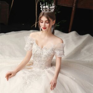 Luxury Tulle Off Shoulder Boat Neck Beading Wedding Dresses For Women 2025 Ball Gowns Court Train Bridal Gown Vestidos De Novia