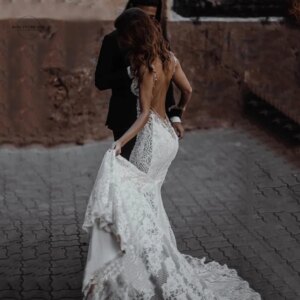 Sexy Backless Mermaid Wedding Dresses 2025 Customized Illusion Deep V Neck Beaded Lace Mermaid Gowns For Bride Robe De Mariée