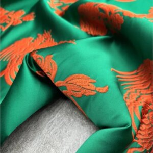 Silk satin fabric green background red embroidery clothing 140cm