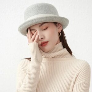 Autumn and winter hat women rolled small brim top European fashion all casual concave shape