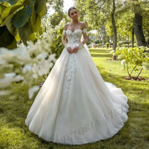 Glamorous Sweetheart  Wedding Dresses for Women Bridal Button Court Train Long Sleeves Lace Appliques Customized