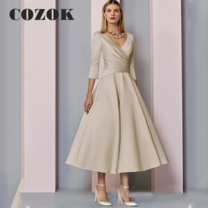 A Line Elegant Champagne Mother Of The Bride Dress V Neck Tea Length Satin Wedding Party Gowns فساتين حفلات Custom BW33