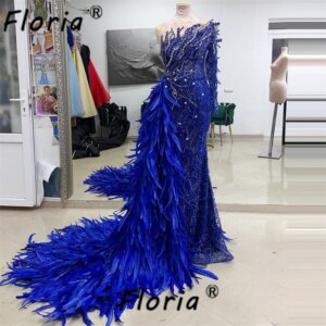 Dubai Woman Royal Blue Beaded Evening Dresses with Long Feathers Train Luxury 3D Appliques Crystals Mermaid Celebrity Party Gown