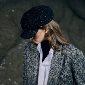 A light luxury elegant fashionable and trendy tweed black octagonal newsboy hat