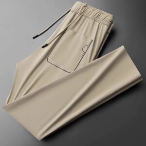 Summer fashion simple color contrast pressed rubber pocket ice silk quick drying light men’s straight leg sports sweatpants casu