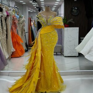 Yellow Beaded Mermaid Party Dress vestidos largos de gala noche Dubai Woman Wedding Gowns Feathers Crystal Appliques Formales