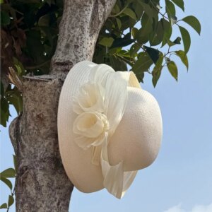 Handwoven hat shade elegant socialite fisherman holiday getaway Hepburn style