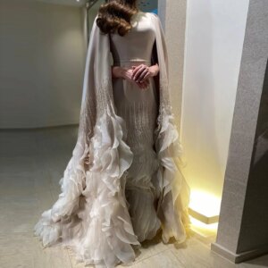 Customized Elegant And Luxurious Evening Gown With Open Sleeves And Layered Pleated Edges Refined And Fashionable Choice Showcas