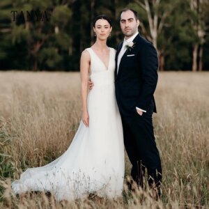 Elegant Soft Tulle Wedding Dress Sleeveless Deep V Neck A Line Sweep Train Bridal Gown Simple Bridal Photoshoot Dress TSWD360