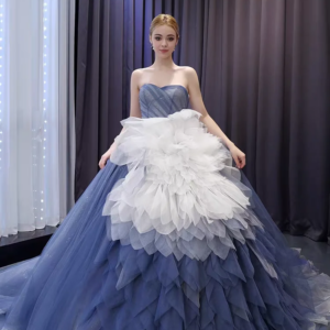 Evening dress in tull, blue strapless dress with folds