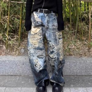 Style Ripped Wrong Visual Printing Technology Jeans Men and Women Loose Casual