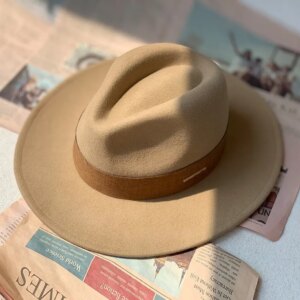 The new autumn and winter flat top hat for men women fashion wide eaves with Europe big round