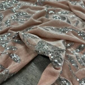 The new designer style pink twine flower heavy embroidery sequin silk velvet fabric is a Chinese-style coat