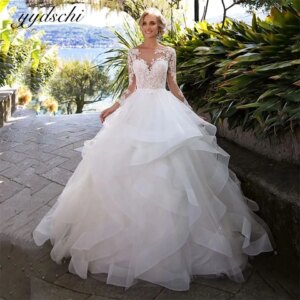 Customized O-Neck Backless Appliques Tulle Cut-out Tiered Full Sleeves Wedding Dresses 2025 Court Train Ball Gown Bridal Gown