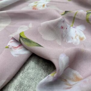 This dress is made of pure silk fabric featuring a thin and transparent georgetic that exudes an ethereal charm