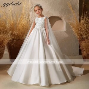 Customized Luxury White Lace Appliques Flower Girl Dress With Cape 2025 White Sleeveless Pearls Beading First Communion Gown