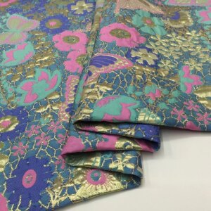 Gold-embossed clothing jacquard embroidery fabric large swing dress performance polyester