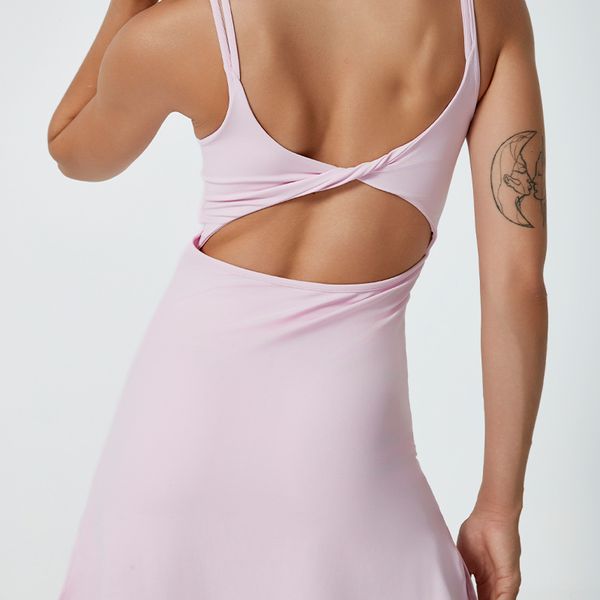 womens round neck cami top with twisted tennis skirt includes builtin shorts