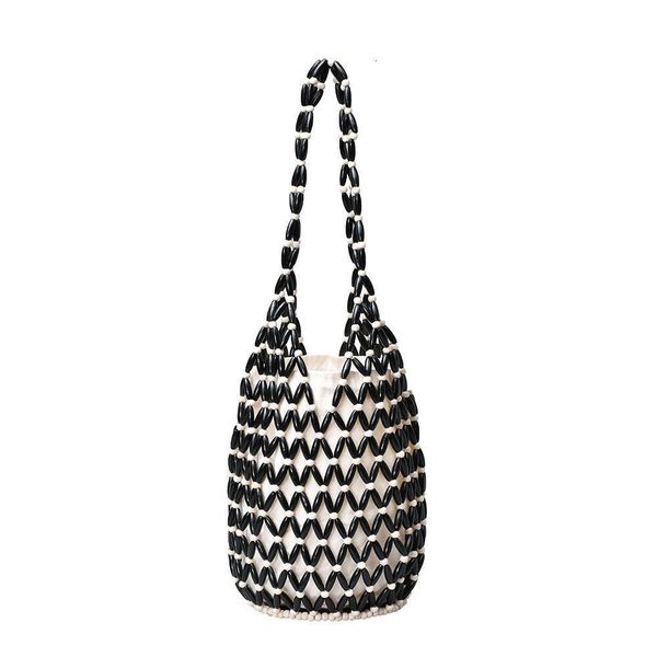 Elegant Woven Tote with Unique Hole Cutout Detailing: Ideal Casual Daytime Accessory