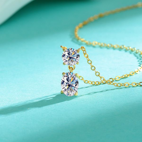 Luxury Women's Jewelry: Elegant Oval Moissanite Pendant Set in Pure White Gold Finish