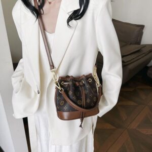 Free shipping 2025 New Designer Fashion high quality Artwork bucket hand bill shoulder crossbody bag for women