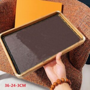 Designer Hand-crafted elegant key placed in brown Black walnut storage trays