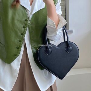 A niche design for street trendy girls a niche love bag a new fashionable and minimalist handbag for women a retro black one shoulder diagonal cross bag trend