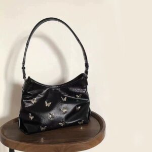 A niche spicy and cool three-dimensional butterfly bag with a new fashionable metal texture handbag light luxury commuting underarm bag