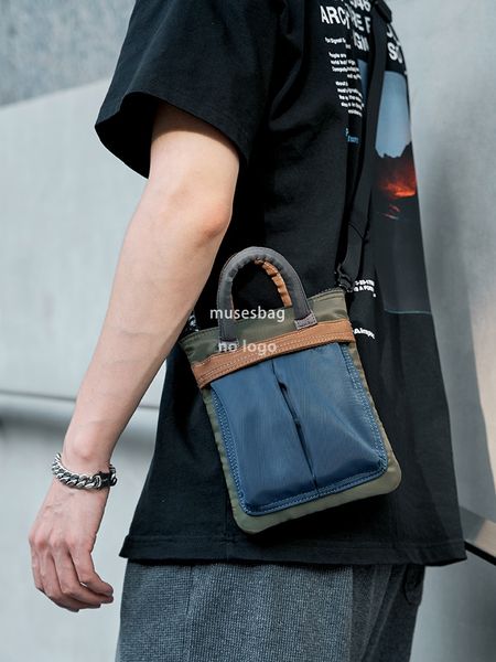 Spot wholesale chest bag male sex mobile phone bag small body bag Japanese sports small bag lightweight trend shoulder bag men's bag