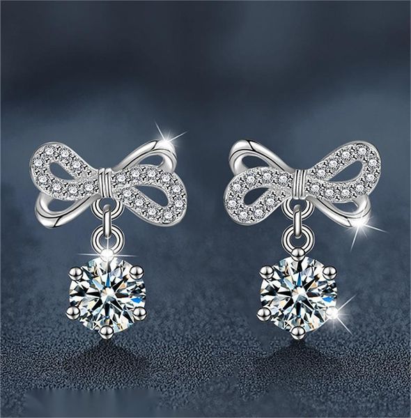 Sterling Silver Butterfly-Knot Moissanite Dangle Earrings.