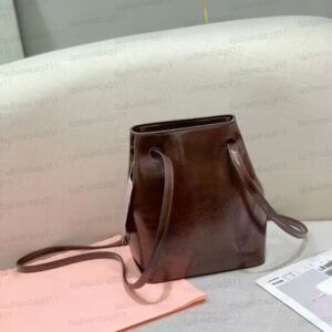 Designer bags Luxury Bag backpack crossbody bag Oil wax leather mini handbag with drawstring double shoulder strap single shoulder bag brown women travel bag