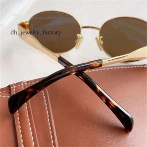 DHcollections10A Womens Designer Sunglasses Retro Small Round Frame Arc de 40235 Oval Frame Sunglasses for Women Metal Mirror Legs Green Lens Fashion Luxury Men fa1