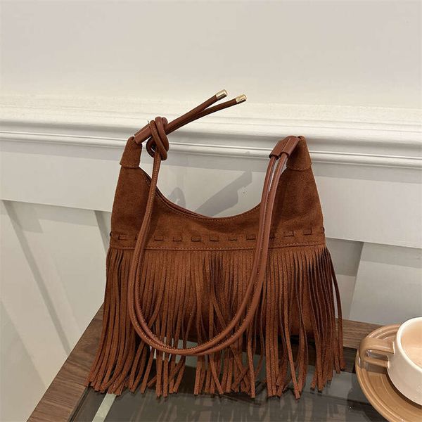 Fashion trend tassel for women, 2024 autumn new casual versatile single shoulder diagonal cross armpit bag