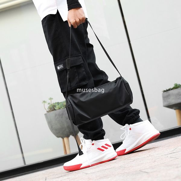 New men's shoulder bag street hip hop style simple sports waterproof crossbody bag fashionable men and women round bucket bag small bag