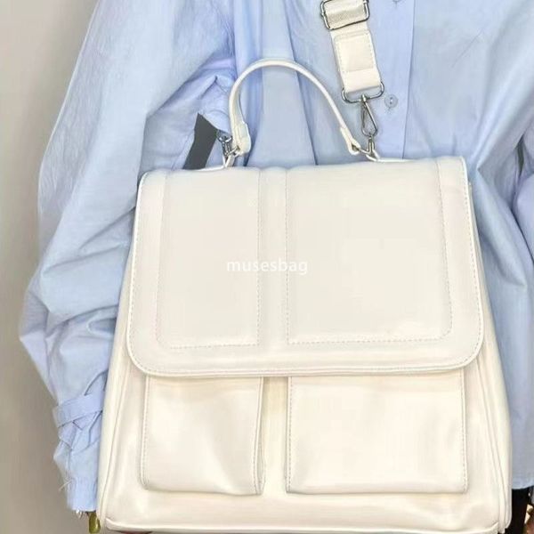 High quality niche design new original student party class commuting milk white backpack versatile diagonal cross bag hand in hand carrying bag