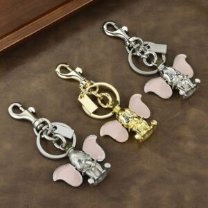 Car keychain featuring a small metal elephant with cute ears that can move, a charming decorative item
