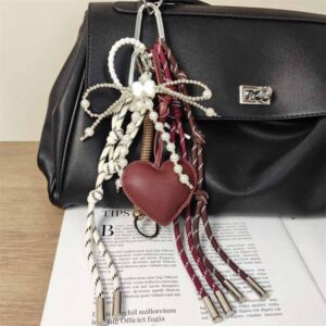 Fashionable plush hanging items in a mixed style | A combination of hand-woven ropes and leather. Unique and distinctive design.