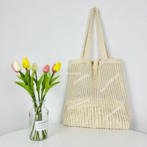 New minimalist and atmospheric single shoulder bag knitted bag with hollowed out design handbag for commuting large capacity tote bag outdoor beach bag women bag