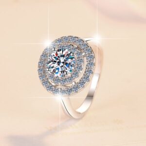 Artisan Crafted Wedding Band Highlighting A Lustrous Single Cut Moissanite Gemstone Amidst Floral Design