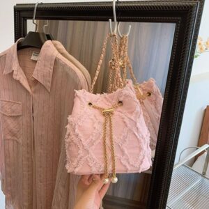 Free shipping niche design bucket New drawstring raw edge women's crossbody fashion simple shoulder bag