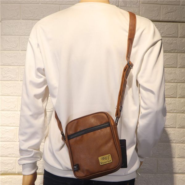 The new Korean version of the trend men's vertical small bag casual men's shoulder bag personality bag men's and women's crossbody bag