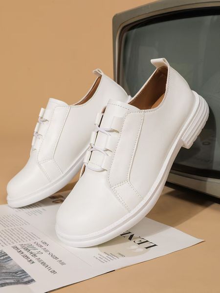 Casual skate shoes for spring-summer: new soft-faced magic tape color-blocking lazy shoes with imitation leather soft soles, fashionable and versatile.