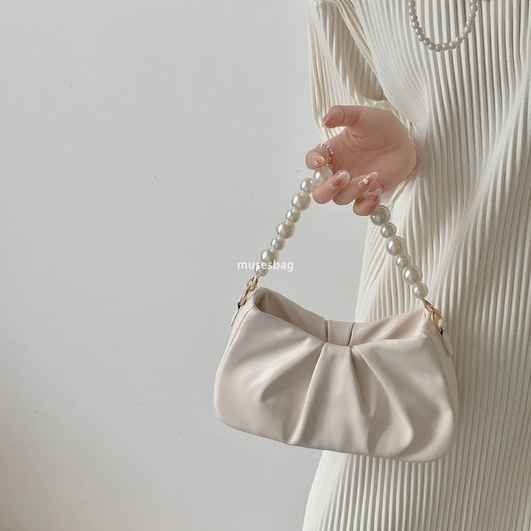 New high-end soft leather handbag with niche design, cloud bag for commuting, portable, single shoulder chain pleated bag, high-end crossbody underarm bag for women