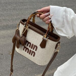 Designer 2025S New Spring Color Contrasting Grass Woven Bamboo Basket Water Bucket Handbag Fashion Shoulder Diagonal Cross Women Bag