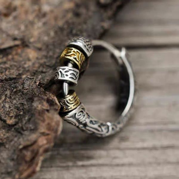 The fusion of classic and modern: Handcrafted 925 silver men's earrings, featuring an eternal floral pattern design, are sold as a pair.