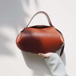 Niche popular 2025 crossbody casual versatile three-dimensional women's armpit small round French stick bag handbag