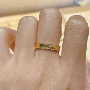 elegant minimalistic copper band ring with polished gold accents versatile daily jewelry