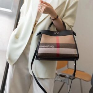 A niche design for European and American retro new styles the same leather canvas contrasting color single shoulder handbag handmade crossbody bag