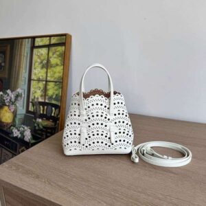 Niche carved pattern design genuine leather handbag hollowed out cowhide crossbody fashionable shoulder vegetable basket bag women's bag